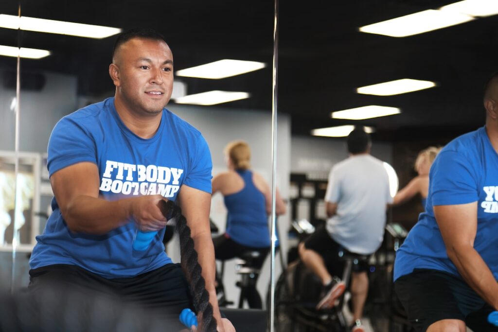 Man rope exercising at Fit Body Boot Camp