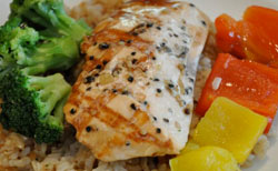 teriyaki salmon with broccoli, rice, and bell peppers